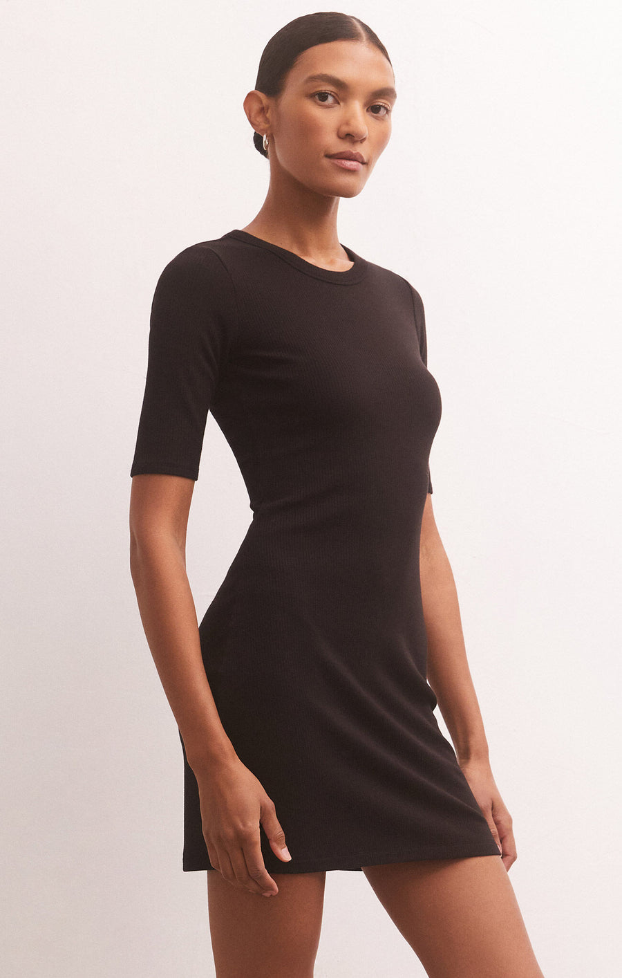 Black shot dress with elbow sleeves.