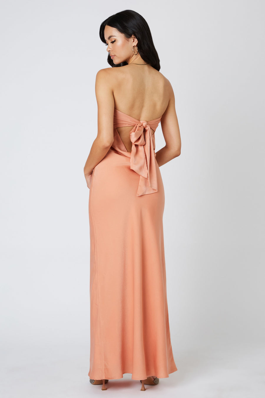 Strapless maxi dress in the color canyon.