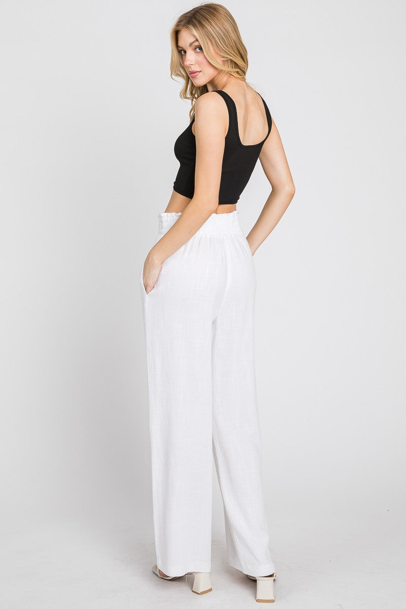 Off white pants with elastic waistband.
