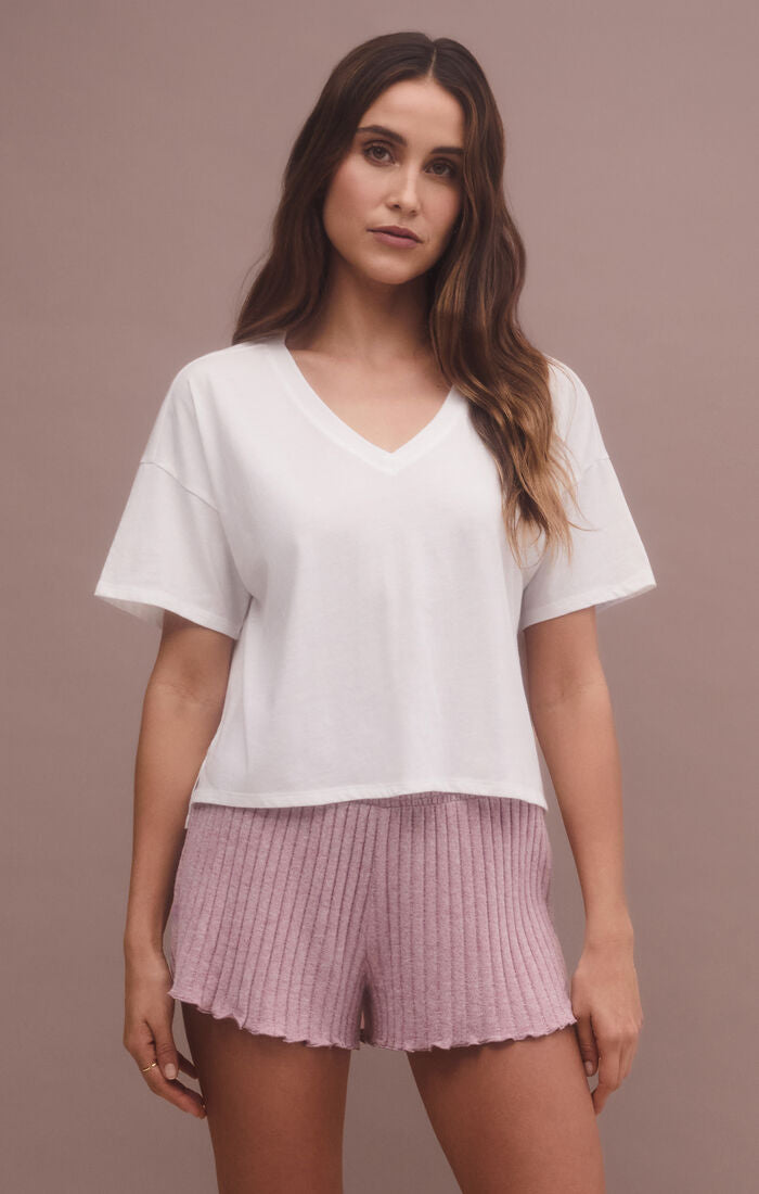 short sleeve cropped shirt in the color bone. 