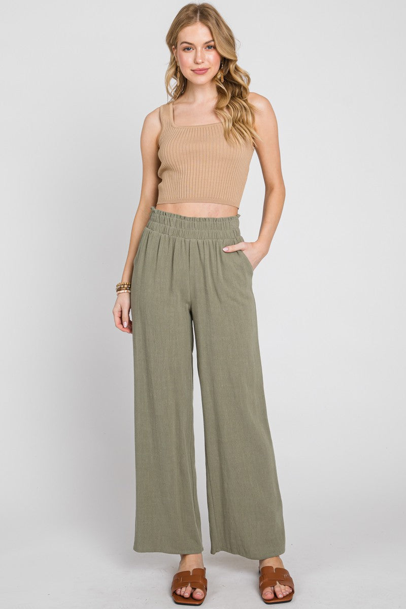 Olive pants with elastic waistband.