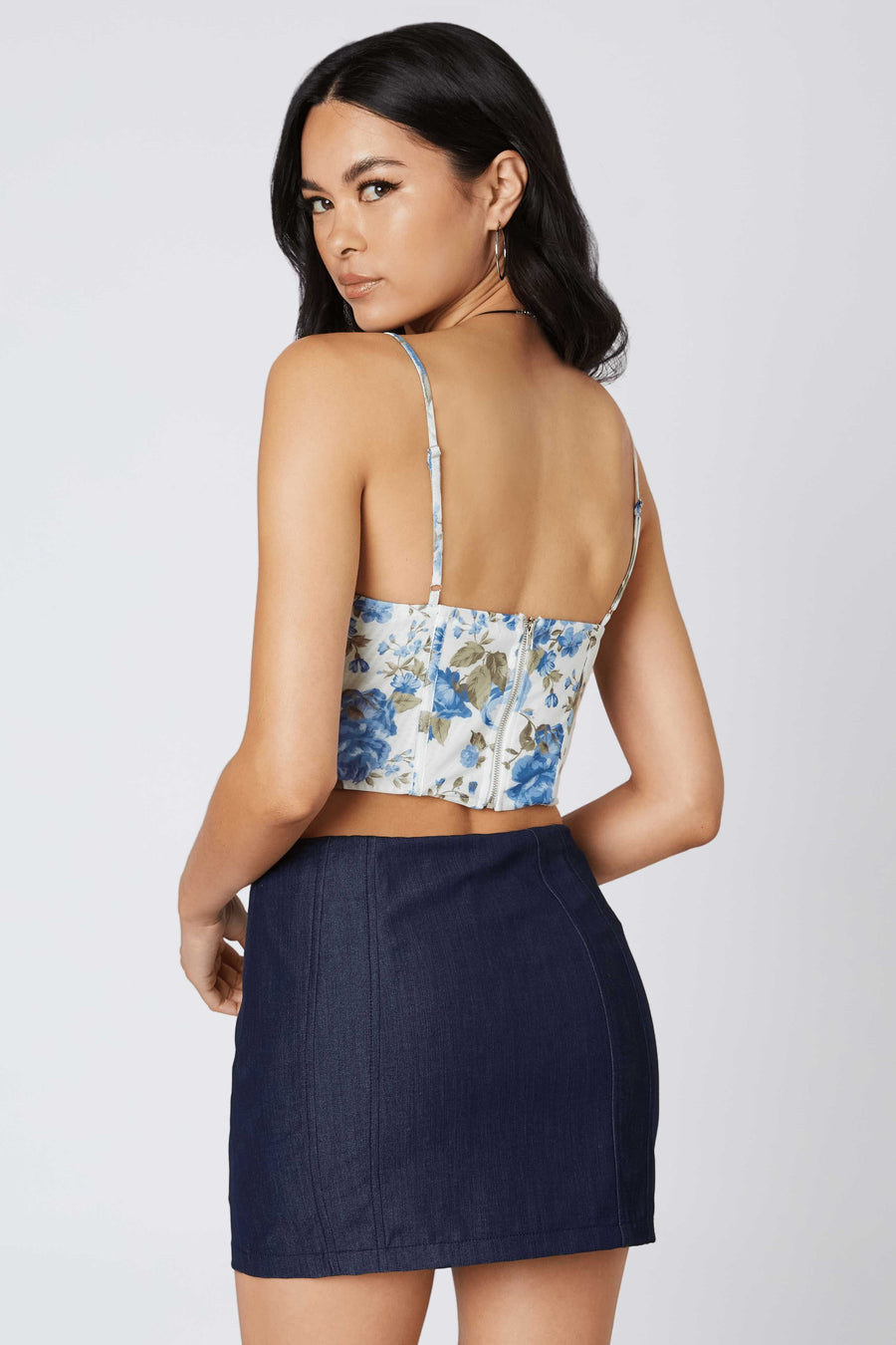  Corset style top with mesh fabric and floral pattern.