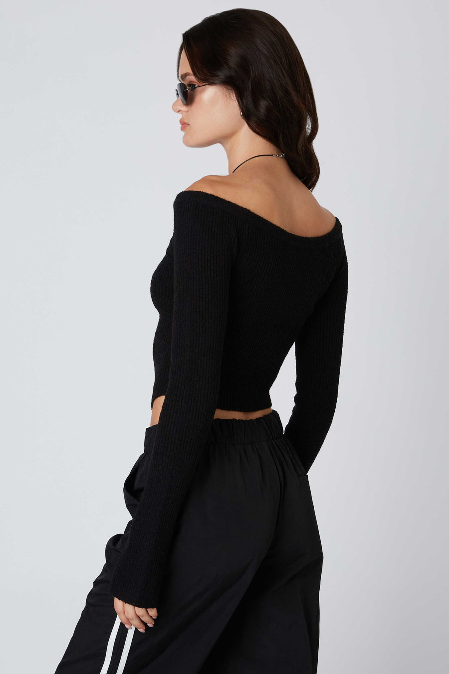 Long sleeve, off-the-shoulder knit sweater.