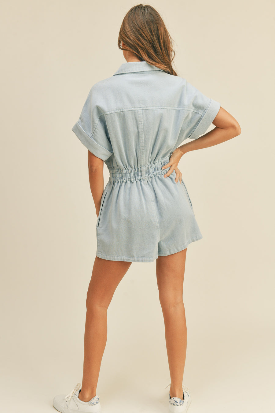 Short sleeve cotton romper with stretchy waistband.