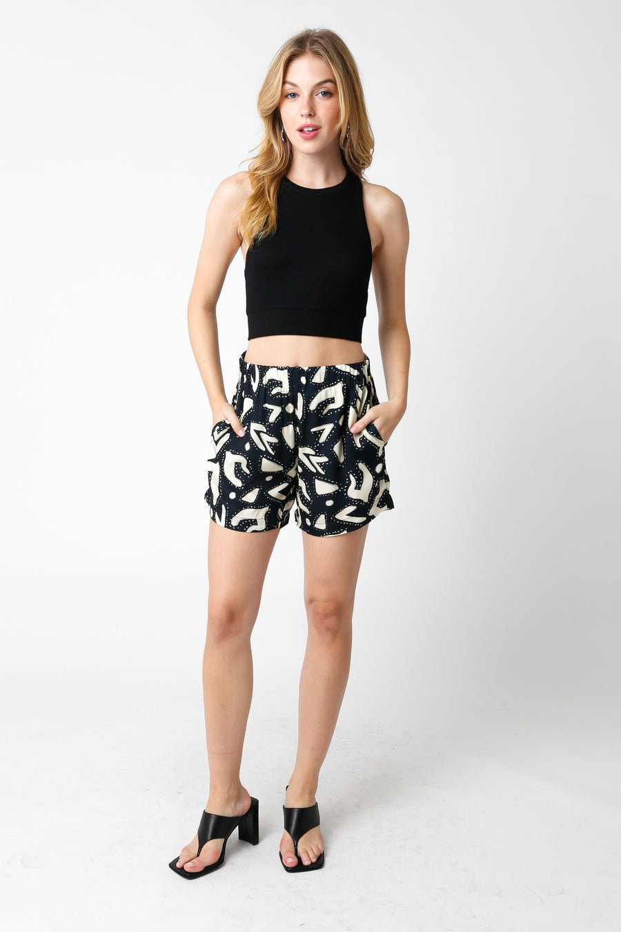 High waisted shorts with smock waistband and pockets.