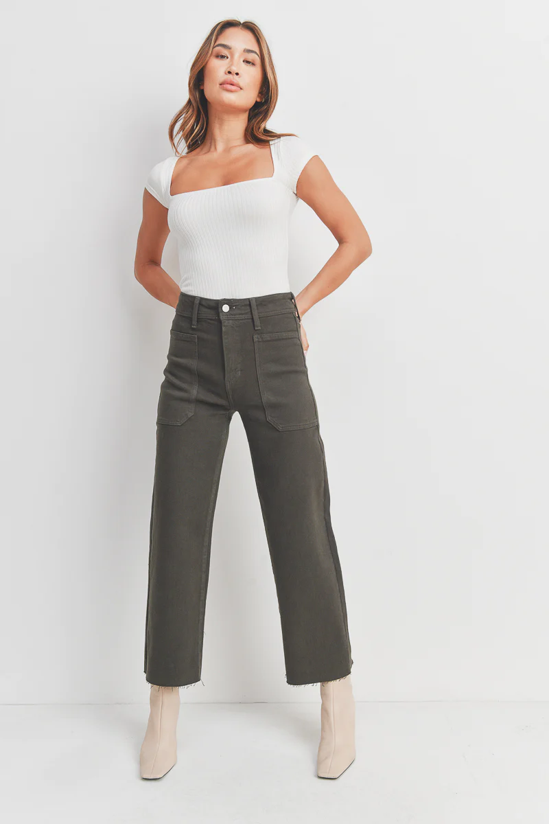High waisted denim pants in the color forest green with front pockets. 