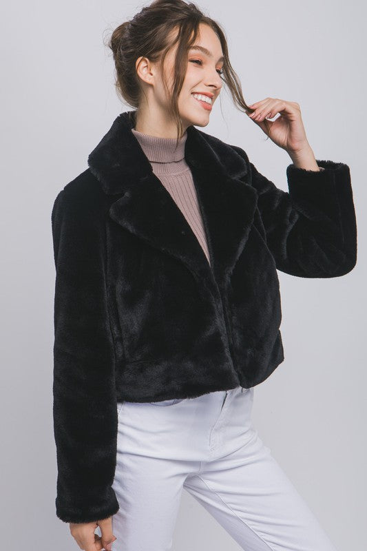 Black faux fur collared jacket. 