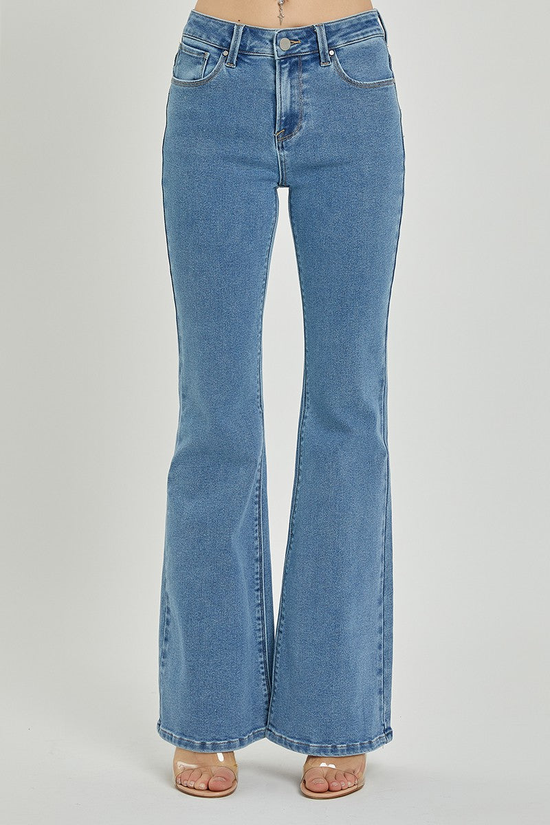 Featuring denim jeans in a medium wash with a bottom flare.