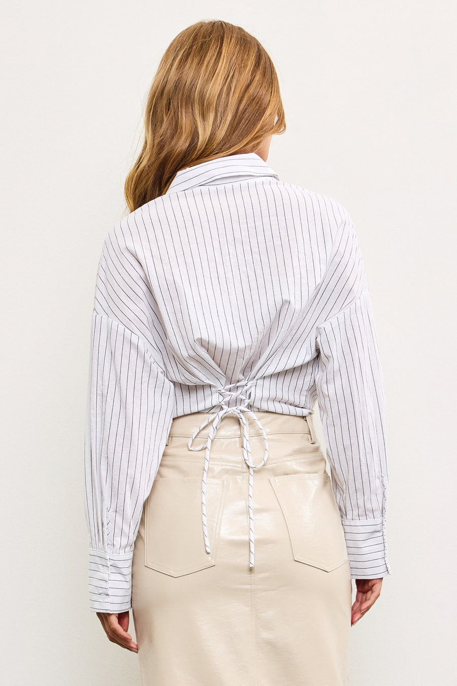 Striped button down with a tied back detail.