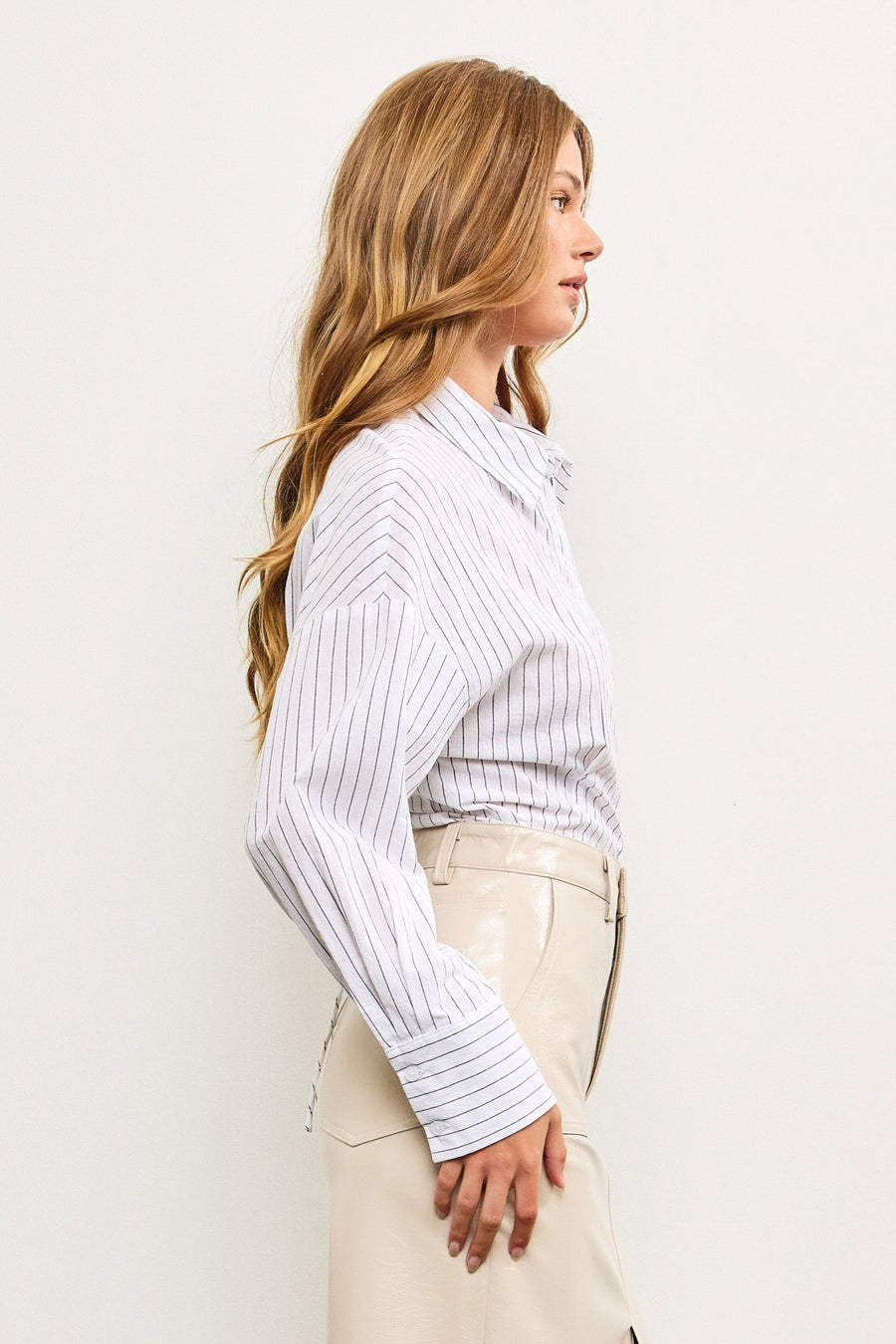 Striped button down with a tied back detail.