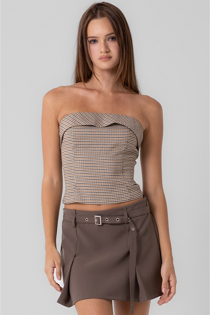 Strapless plaid top with zipper closure.