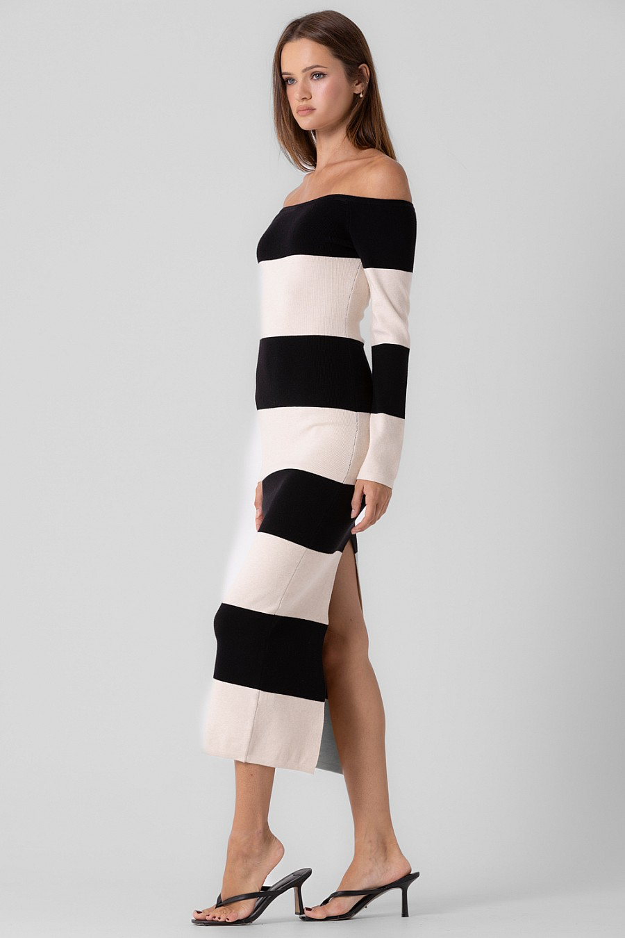 Long sleeve, strapless, striped midi dress with back slit.