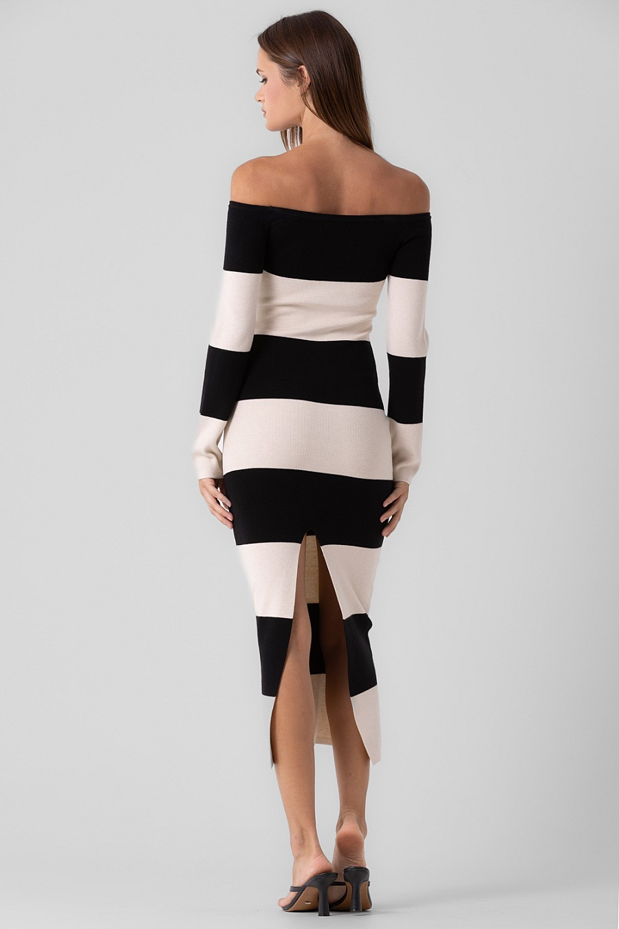 Long sleeve, strapless, striped midi dress with back slit.