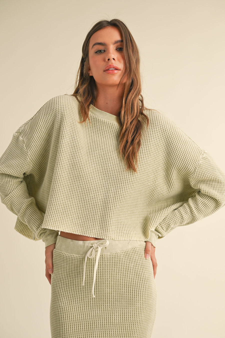 Featuring a washed rib knitted long sleeve