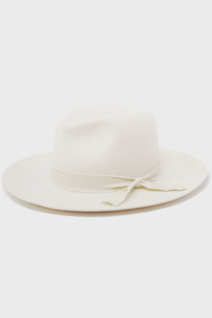 Featuring a beatiful stylish pinched crown hat with a decorative band and inner adjustable velcro strap to cinch down for sizing in the color ivory white