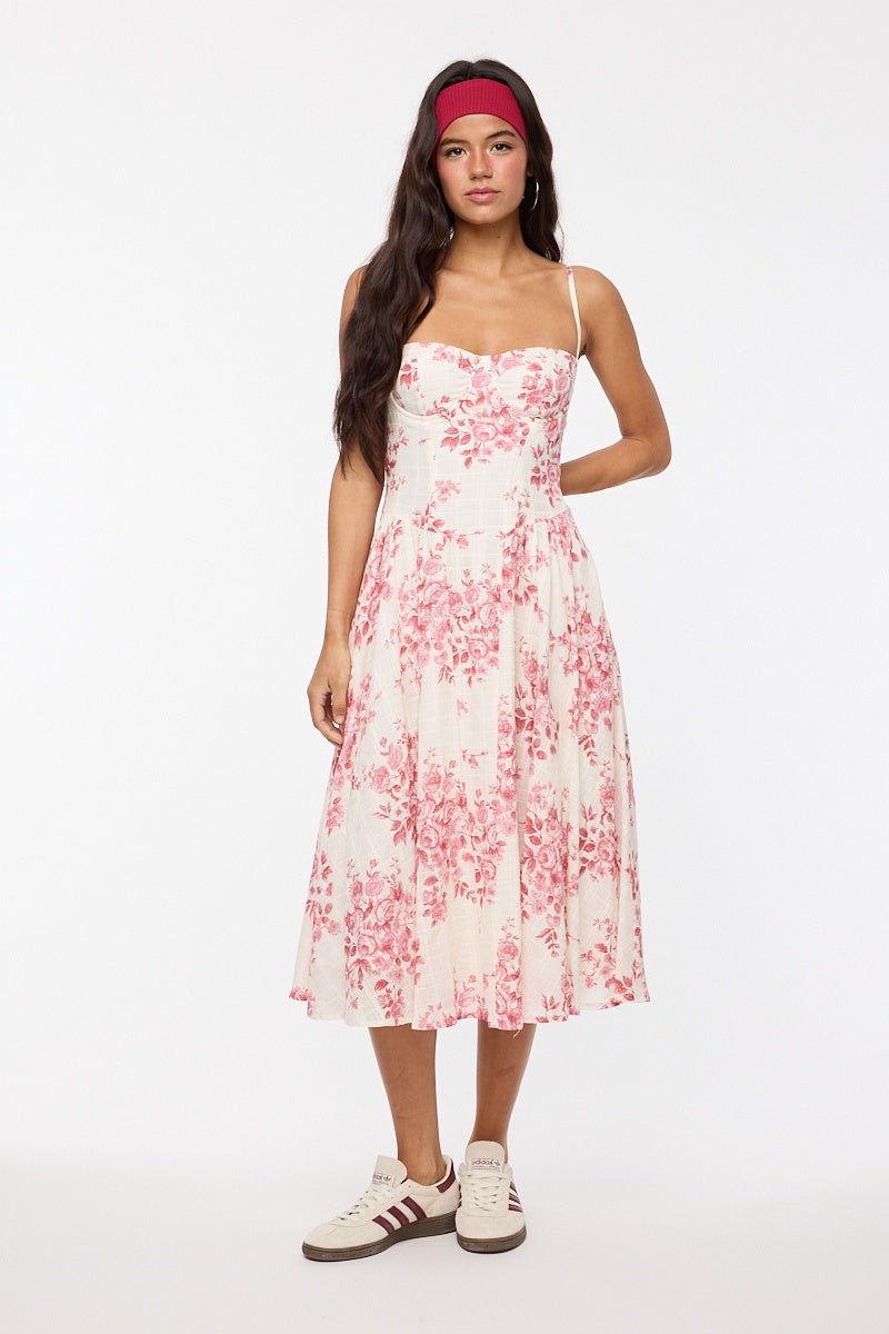 Featuring a heart neckline floral print midi dress in the colors pink and white 