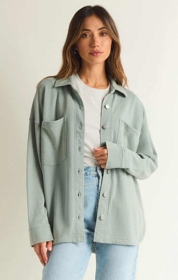 Oversized button up jacket with front pockets in color Worn Jade 