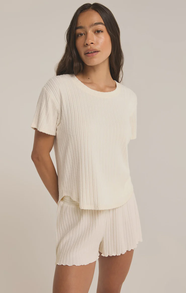 Featuring a ribbed tee shirt in colors bone and meadow