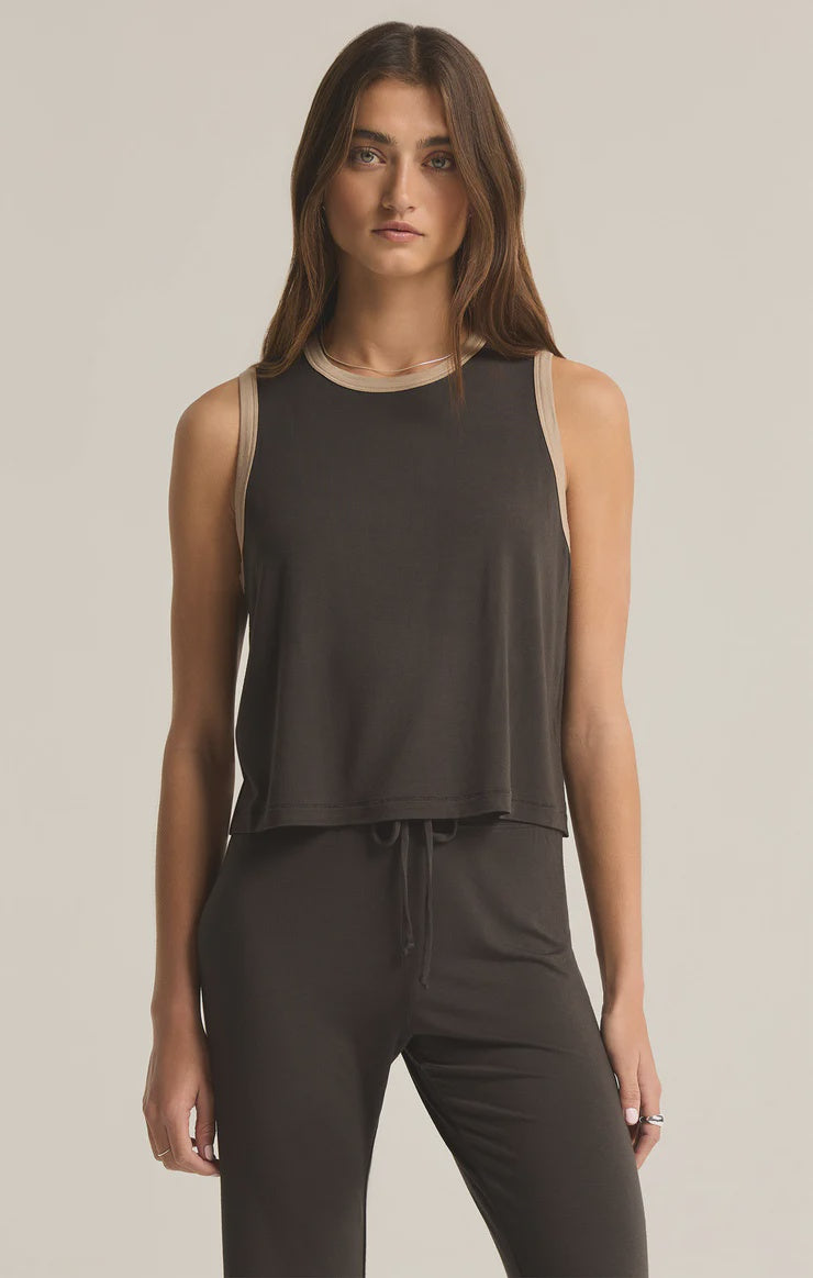 Featuring a sleeveless lounge tank in the color black sand 