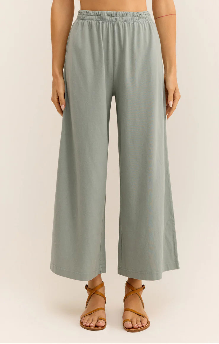 Featuring an elastic high waisted crop pant in the color harbor grey 