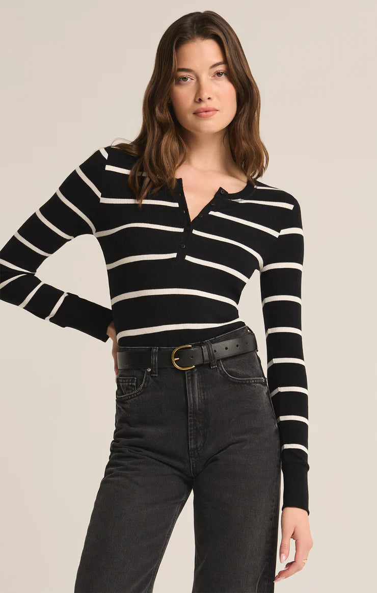 Featuring a striped longsleeve button up top in the color black 