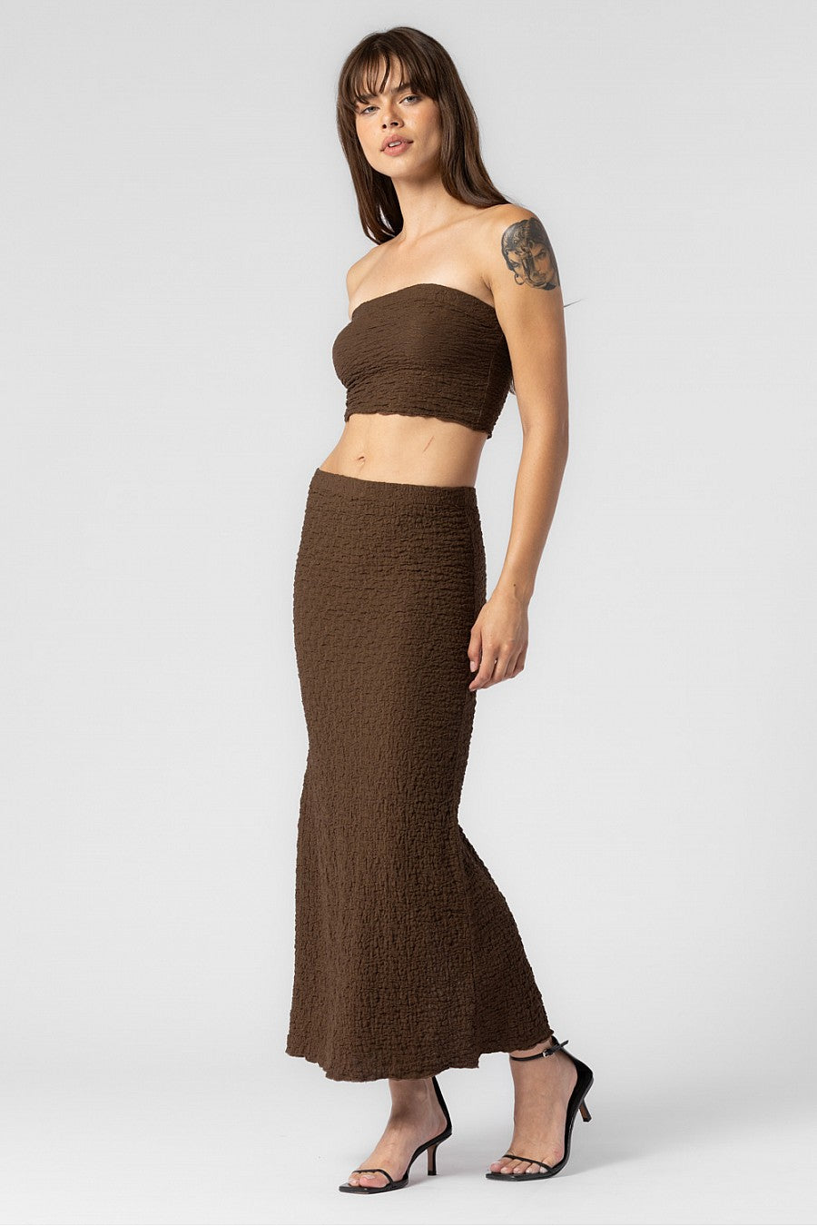 Brown midi skirt with back slit. 