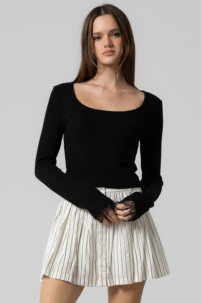 Featuring a ribbed fitted long sleeve square neck top in the color black 