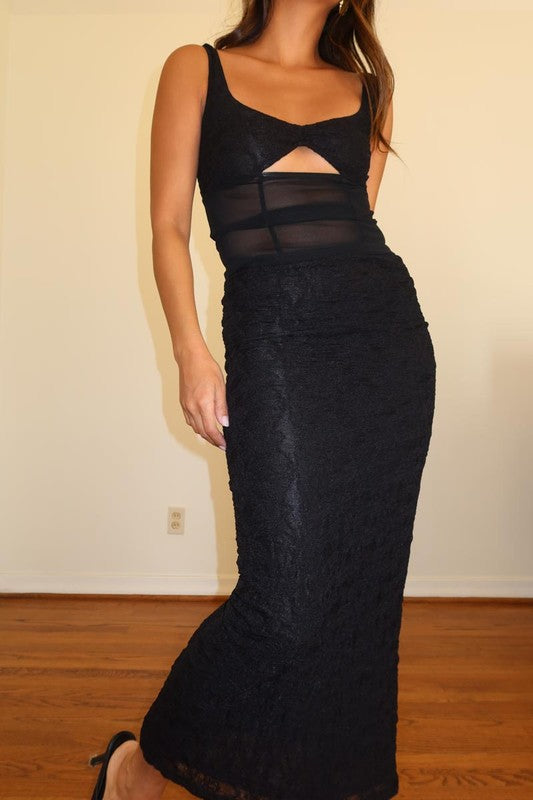 Pairs with the matching Jocelyn Skirt Featuring a lace/mesh tank top with a center cutout in the color black