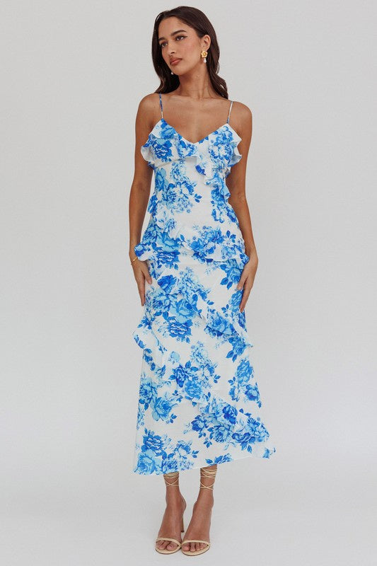 Featuring a ruffled foral midi dress in the color blue 