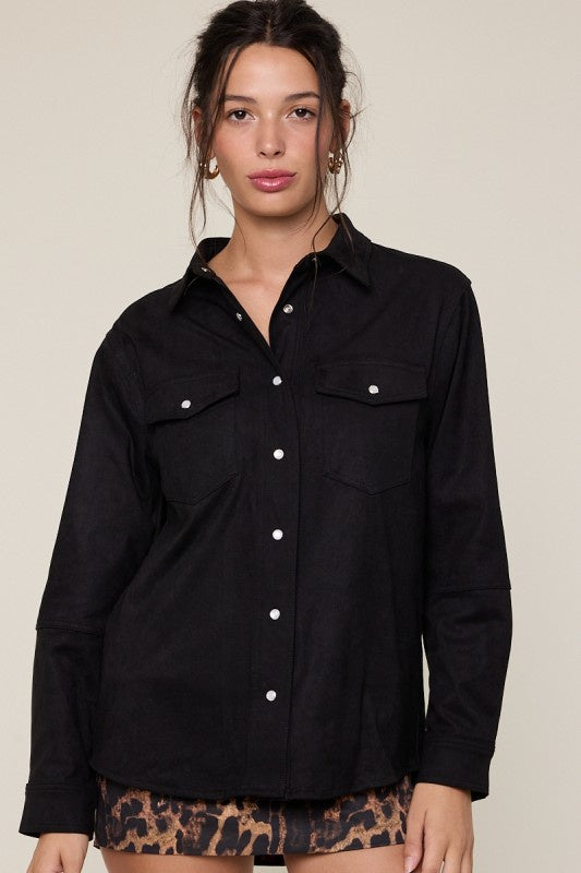 Featuring a black collared button down suede jacket