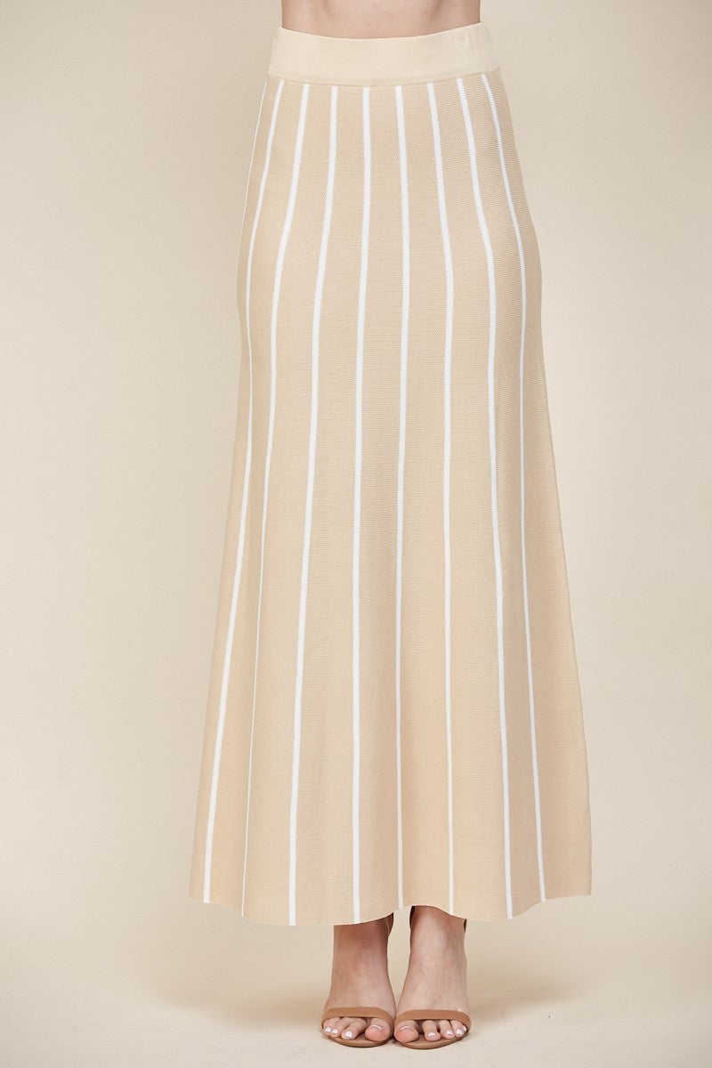 Featuring a two tone stripe knit midi skirt