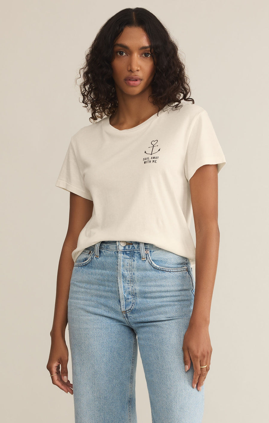 Featuring a short sleeve crew neck top with the logo 'Sail Away With Me' in the color sea salt 