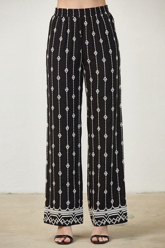 Pairs with the matching 'Laila Top'

Featuring a wide let pant with geometric print