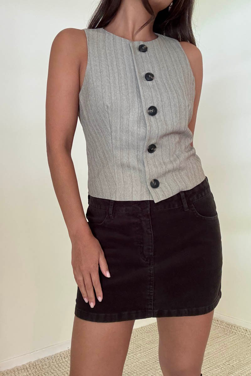 Featuring a striped herringbone button down vest