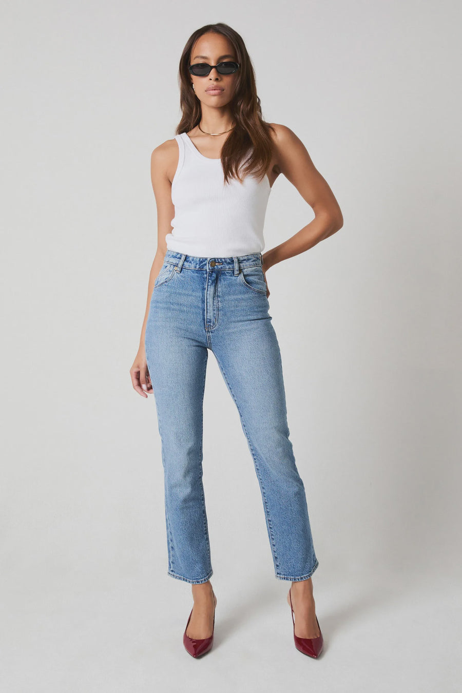 Featuring a light wash denim stright leg jean