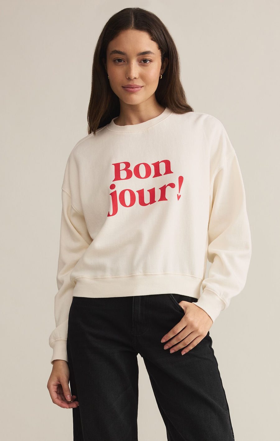 Featuring a crew neck long sleeve top with the logo 'Bon Jour!' in the color sea salt 