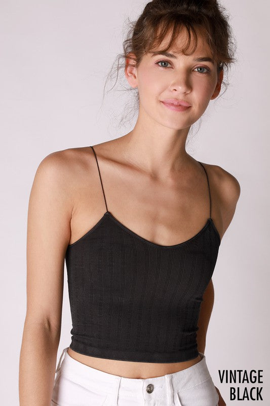 Cropped ribbed top with skinny straps.