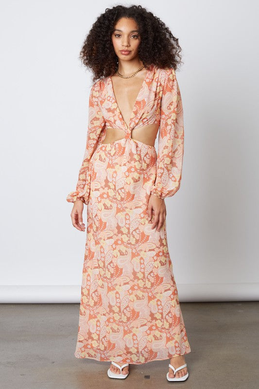 Long sleeved paisley printed maxi dress with side cut outs. 