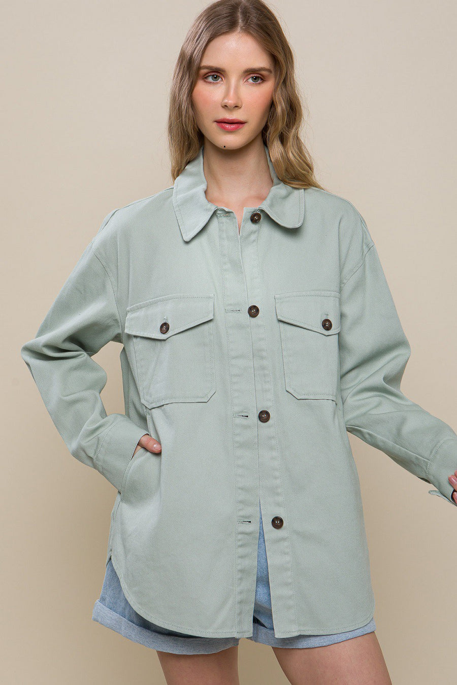 Oversized denim jacket in the color moss.