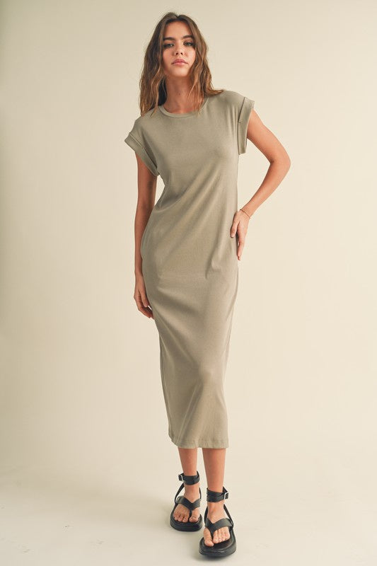 Featuring a Midi short sleeve dress with pockets on each side in the color stone 