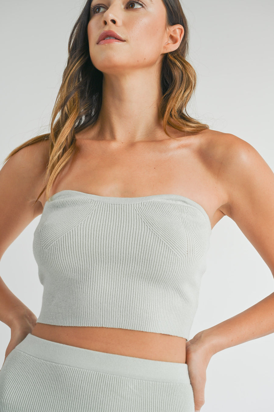 Strapless cropped top in the color light sage. 