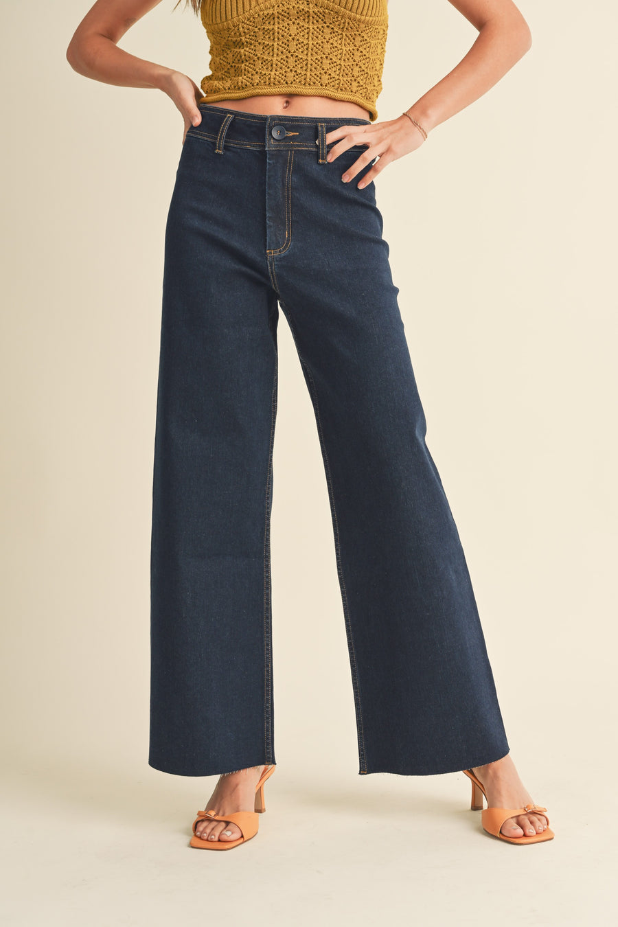  Featuring a wide leg pant with stretched denim in the color indigo