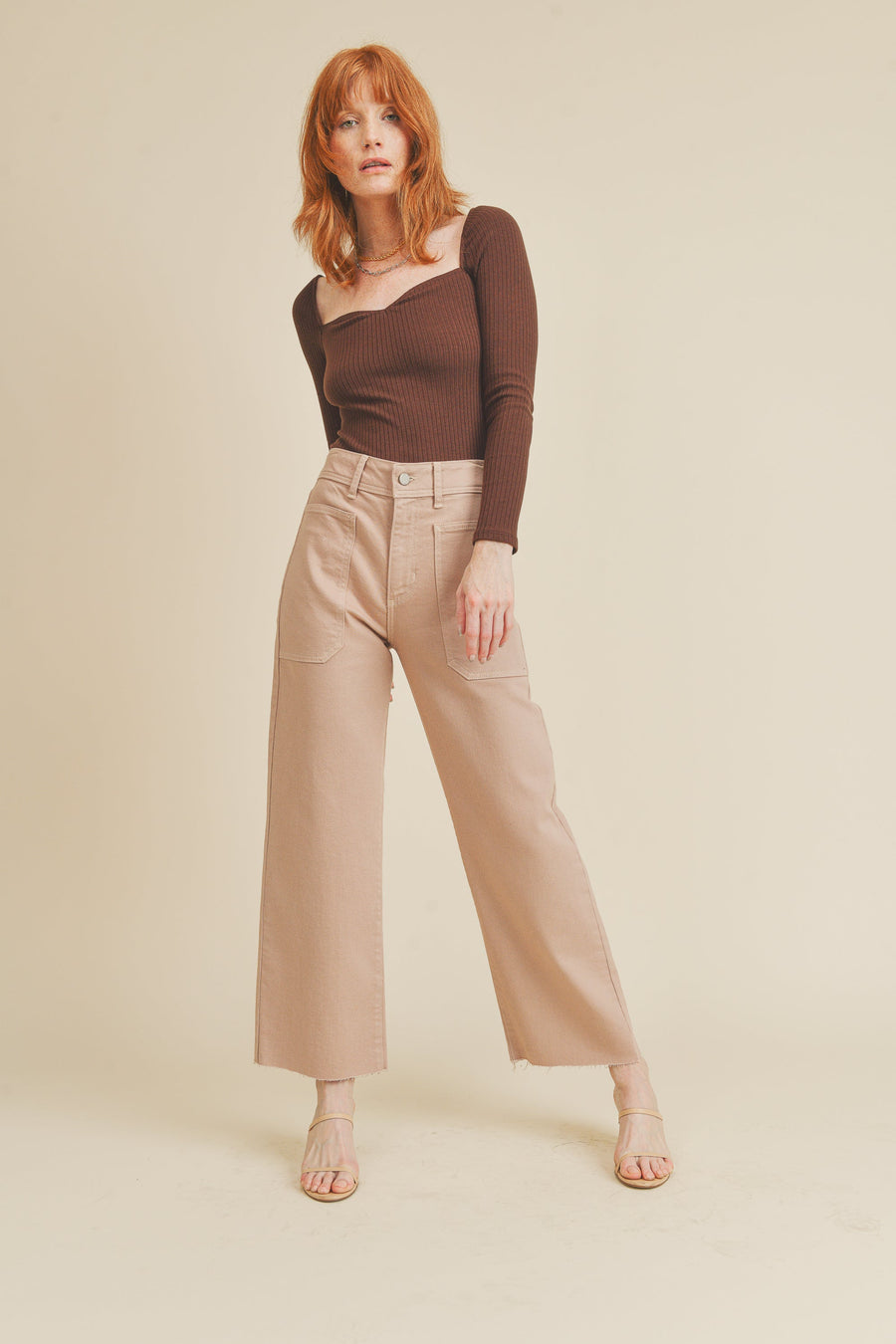 Wide leg cropped jeans in the color clay.