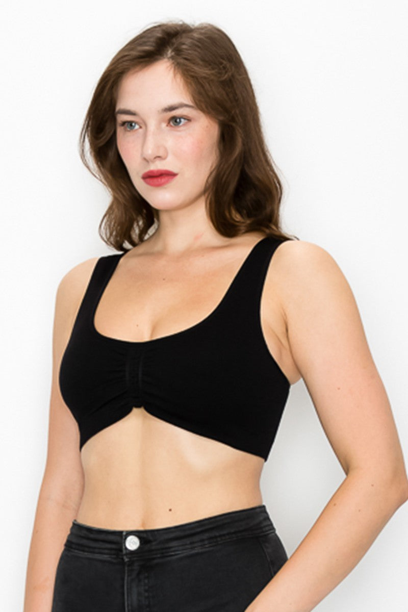 Black sports bra with a round neckline.