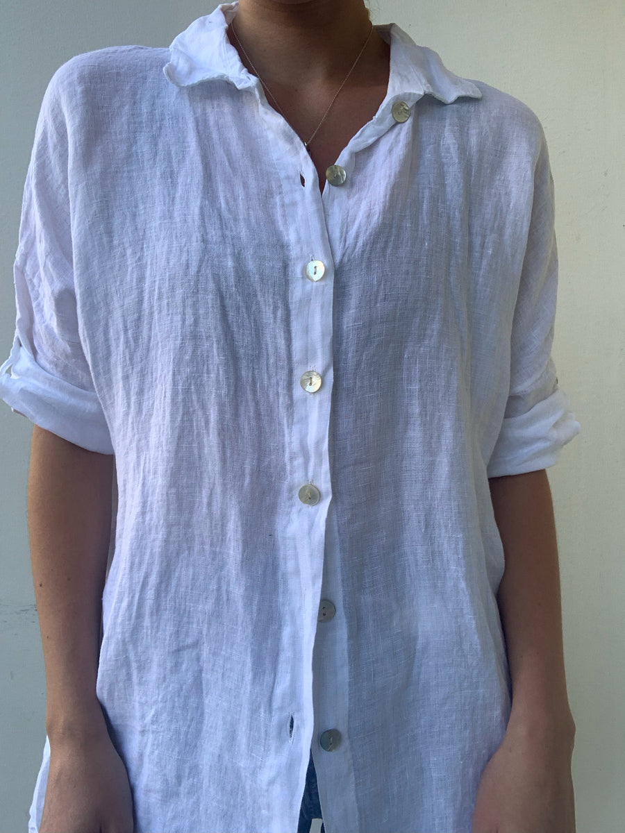 White button down linen tshirt with white buttons down the middle