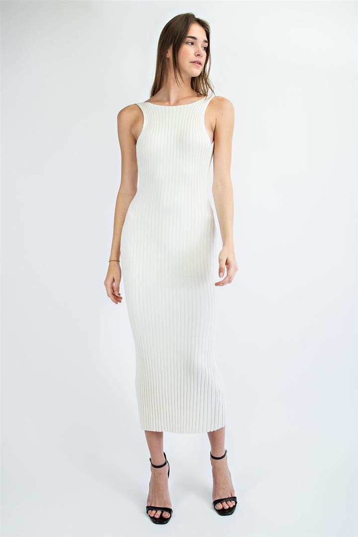 Model is wearing a white sleeveless midi dress.