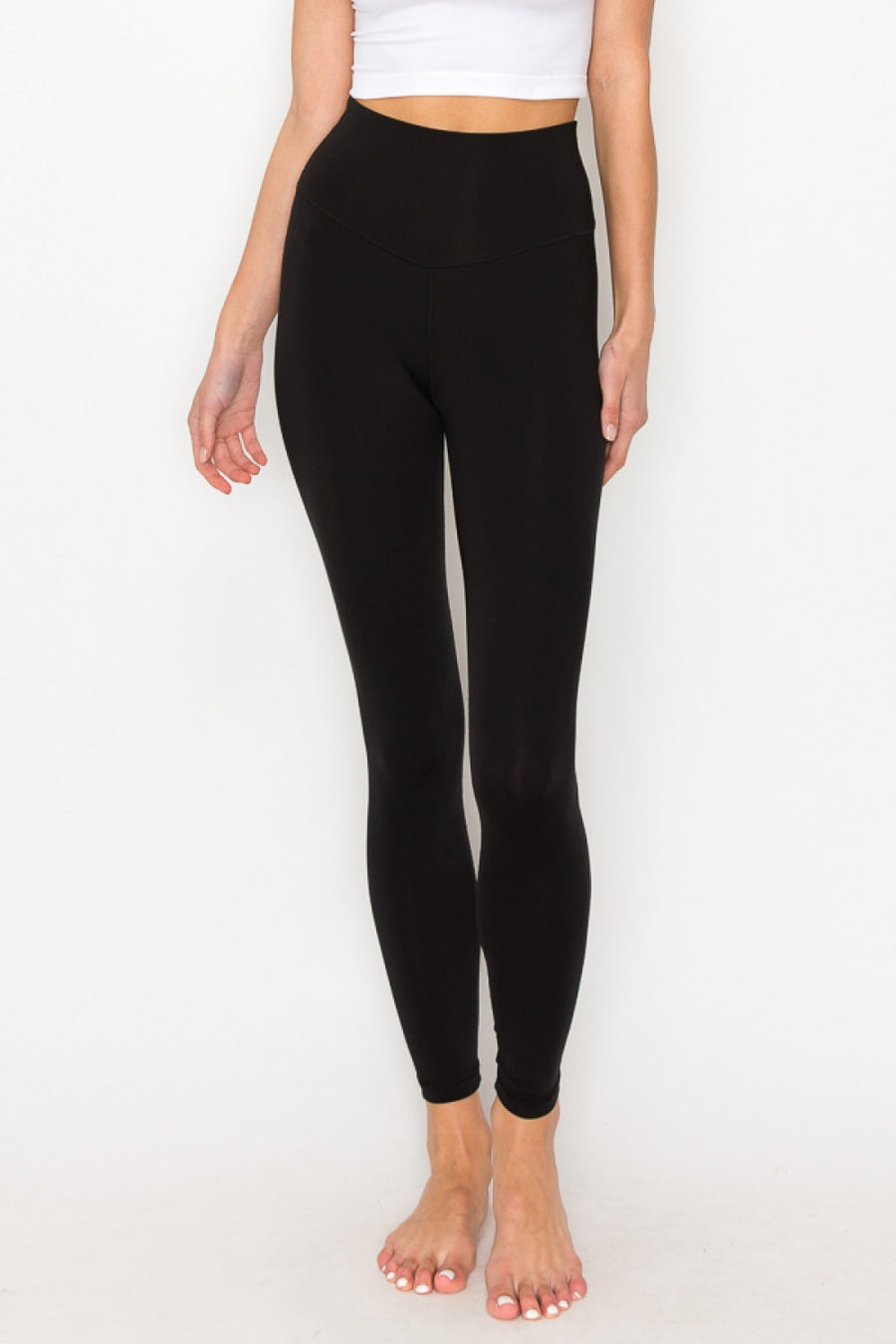 Featuring a full length high waisted legging in the colors black and ash 