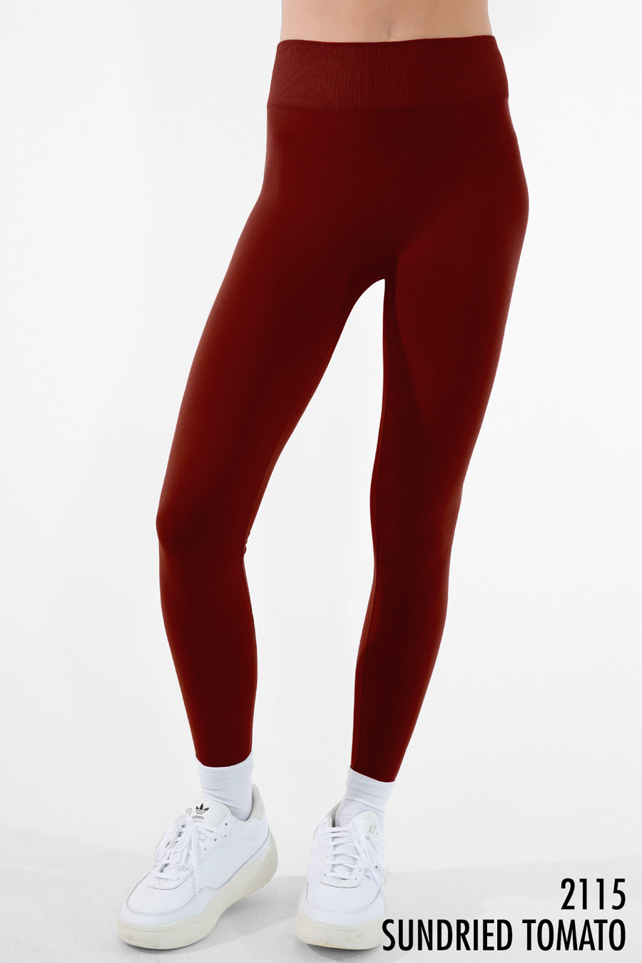High waisted leggings in the color sun dried tomatoes.