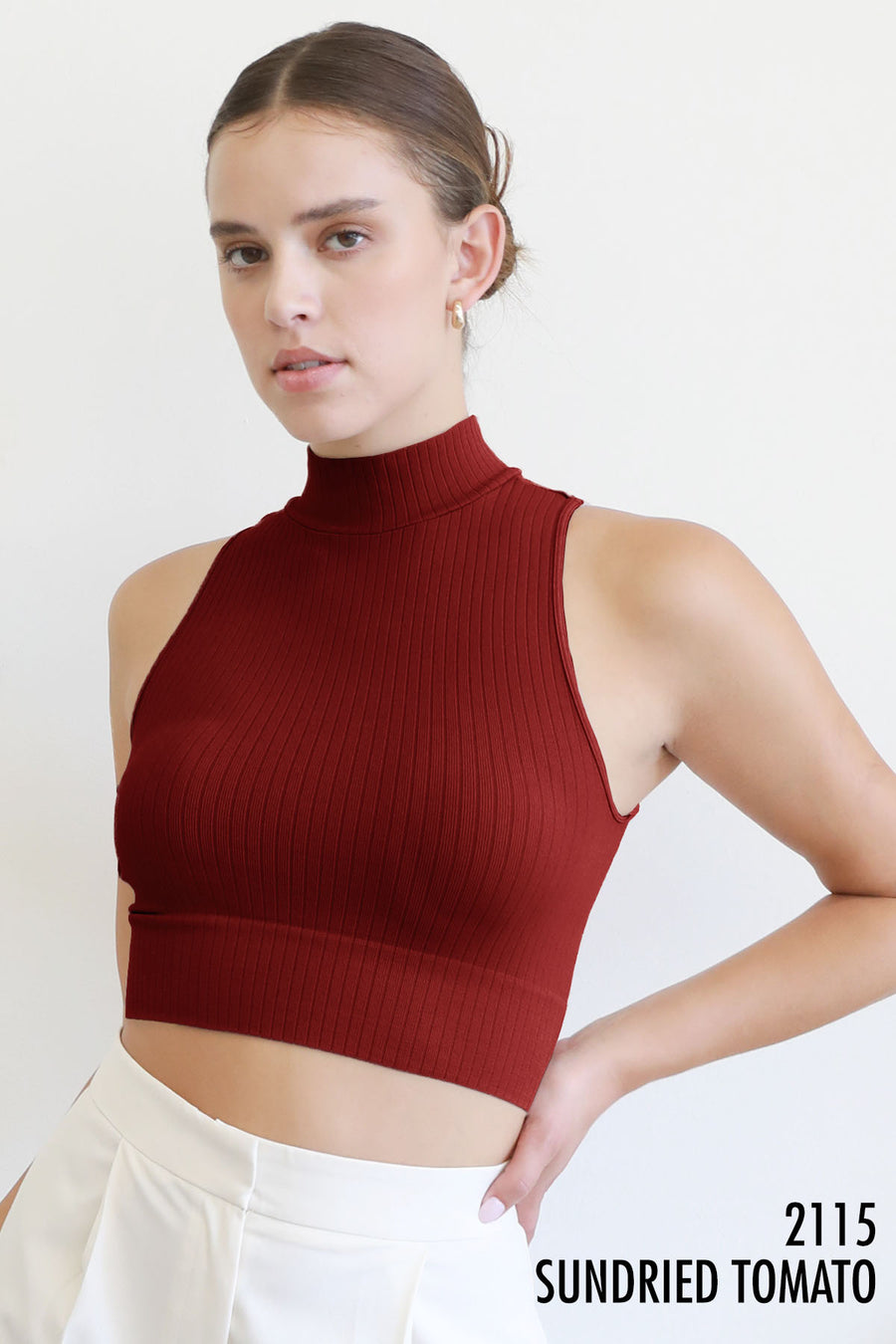 Ribbed mock neck top in the color sun dried tomato.