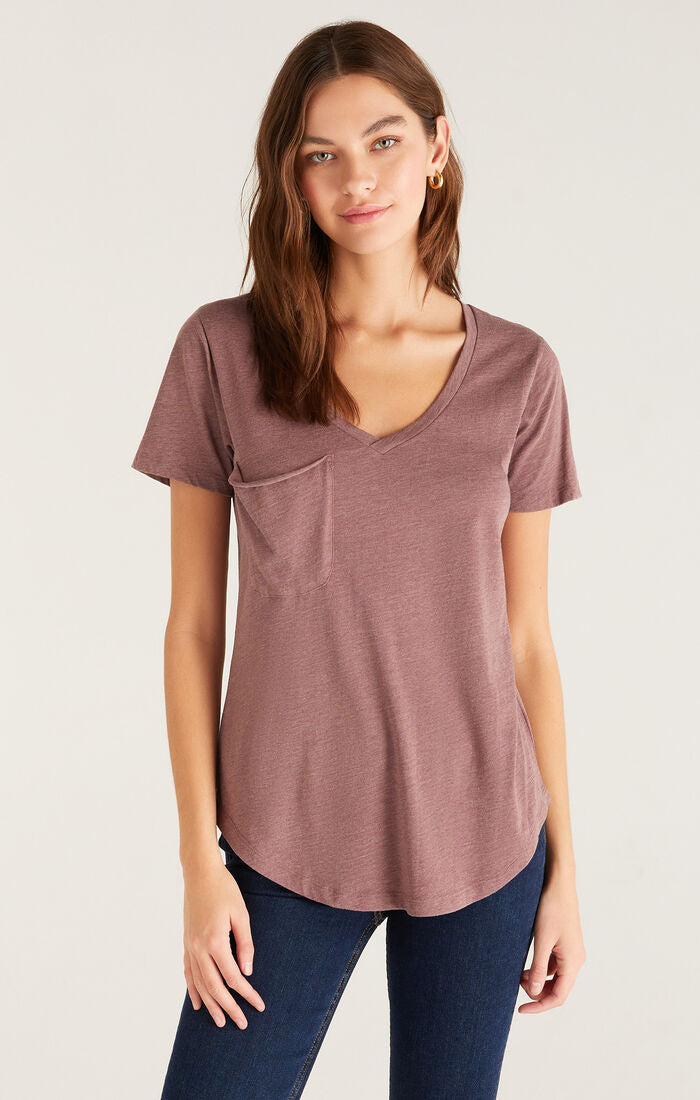 Soft v-neck light red-brown tee with pocket on right side of chest. 